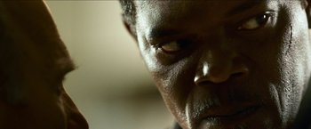 Movie still from “Cleaner” (2007), directed by Renny Harlin – A man's face with his eyes closed; Extreme Close Up shot, Over the shoulder angle