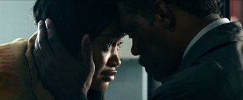 Movie still from “Cleaner” (2007), directed by Renny Harlin – Two people face to face; Close Up shot, Over the shoulder angle