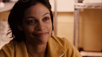 Movie still from “Clerks II” (2006), directed by Kevin Smith – A person wearing a yellow jacket smiling; Close Up shot, High angle