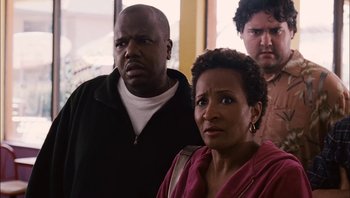 Movie still from “Clerks II” (2006), directed by Kevin Smith – A man and a woman standing next to each other; Close Up shot, Low angle