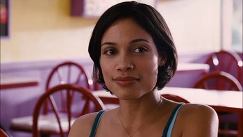 Movie still from “Clerks II” (2006), directed by Kevin Smith – A person sitting at a table; Close Up shot, Over the shoulder angle