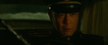 Movie still from “Cliff Walkers” (2021), directed by Yimou Zhang – A person wearing a uniform; Close Up shot, Low angle