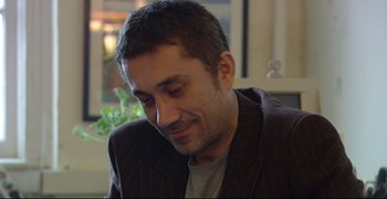 Movie still from “Climates” (2006), directed by Nuri Bilge Ceylan – A person wearing a jacket; Close Up shot, Low angle