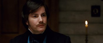 Movie still from “Cloud Atlas” (2012), directed by Lilly Wachowski – A person with a mustache; Close Up shot, High angle