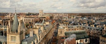 Movie still from “Cloud Atlas” (2012), directed by Lilly Wachowski – An aerial view of a city with many buildings; Extreme Wide shot, High angle