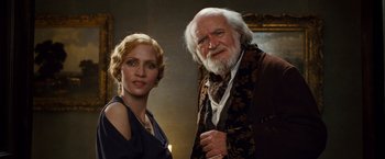 Movie still from “Cloud Atlas” (2012), directed by Lilly Wachowski – A man and a woman standing next to each other; Close Up shot, Low angle