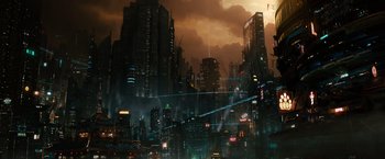 Movie still from “Cloud Atlas” (2012), directed by Lilly Wachowski – A city with a lot of lights on the buildings; Extreme Wide shot, High angle