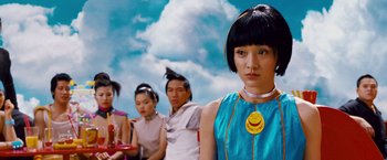 Movie still from “Cloud Atlas” (2012), directed by Lilly Wachowski – A group of people standing next to each other in front of a cloudy sky; Close Up shot, Over the shoulder angle