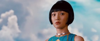 Movie still from “Cloud Atlas” (2012), directed by Lilly Wachowski – A person wearing a blue shirt; Close Up shot, Low angle