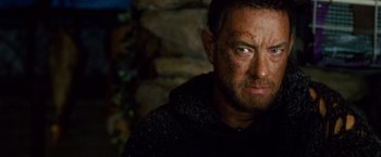 Movie still from “Cloud Atlas” (2012), directed by Lilly Wachowski – A person wearing a black shirt; Close Up shot, Over the shoulder angle