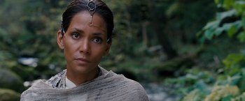 Movie still from “Cloud Atlas” (2012), directed by Lilly Wachowski – A person wearing a headpiece; Close Up shot, Over the shoulder angle