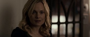 Movie still from “Clown” (2014), directed by Jon Watts – A person with long hair; Close Up shot, Over the shoulder angle