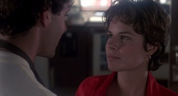 Movie still from “Cocoon” (1985), directed by Ron Howard – A man and a woman looking at one another; Close Up shot, Over the shoulder angle