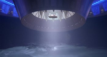 Movie still from “Cocoon” (1985), directed by Ron Howard – An image of an inside of a spaceship; Extreme Wide shot, Low angle