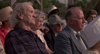 Movie still from “Cocoon” (1985), directed by Ron Howard – An older man and woman sitting next to each other; Close Up shot, Low angle