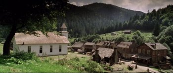 Movie still from “Cold Mountain” (2003), directed by Anthony Minghella – An image of an old time town in the mountains; Extreme Wide shot, High angle