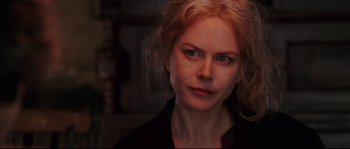 Movie still from “Cold Mountain” (2003), directed by Anthony Minghella – A person wearing a black shirt; Close Up shot, Over the shoulder angle