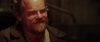 Movie still from “Cold Mountain” (2003), directed by Anthony Minghella – A person with a beard; Close Up shot, Over the shoulder angle