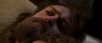 Movie still from “Cold Mountain” (2003), directed by Anthony Minghella – A person with a beard; Close Up shot, High angle