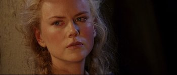 Movie still from “Cold Mountain” (2003), directed by Anthony Minghella – A person with long hair; Close Up shot, Over the shoulder angle