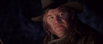 Movie still from “Cold Mountain” (2003), directed by Anthony Minghella – A person wearing a cowboy hat; Close Up shot, Low angle