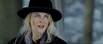 Movie still from “Cold Mountain” (2003), directed by Anthony Minghella – A person wearing a hat; Close Up shot, Over the shoulder angle