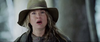Movie still from “Cold Mountain” (2003), directed by Anthony Minghella – A person wearing a hat; Close Up shot, Low angle