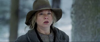 Movie still from “Cold Mountain” (2003), directed by Anthony Minghella – A person wearing a hat; Close Up shot, Low angle