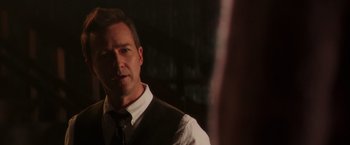 Movie still from “Collateral Beauty” (2016), directed by David Frankel – A person wearing a vest and a tie; Close Up shot, Over the shoulder angle