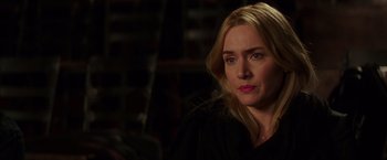 Movie still from “Collateral Beauty” (2016), directed by David Frankel – A person wearing a black shirt; Close Up shot, Over the shoulder angle