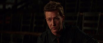 Movie still from “Collateral Beauty” (2016), directed by David Frankel – A person wearing a shirt and tie; Close Up shot, Over the shoulder angle