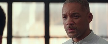 Movie still from “Collateral Beauty” (2016), directed by David Frankel – A person with a beard looking at the camera; Close Up shot, Over the shoulder angle