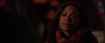 Movie still from “Collateral Beauty” (2016), directed by David Frankel – A person wearing a scarf; Close Up shot, Over the shoulder angle