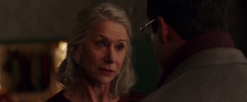 Movie still from “Collateral Beauty” (2016), directed by David Frankel – An older woman looking at a younger man; Close Up shot, Over the shoulder angle