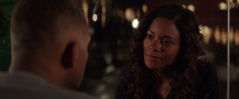 Movie still from “Collateral Beauty” (2016), directed by David Frankel – A man and a woman sitting in front of each other; Close Up shot, Over the shoulder angle