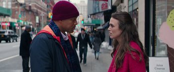 Movie still from “Collateral Beauty” (2016), directed by David Frankel – A man and a woman talking on the sidewalk; Medium shot, Over the shoulder angle