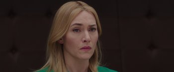 Movie still from “Collateral Beauty” (2016), directed by David Frankel – A person with blonde hair and blue eyes; Close Up shot, Over the shoulder angle