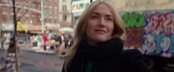 Movie still from “Collateral Beauty” (2016), directed by David Frankel – A person wearing a black jacket; Close Up shot, Over the shoulder angle