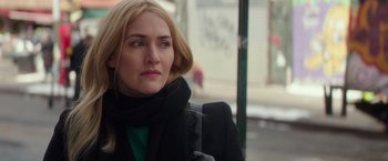 Movie still from “Collateral Beauty” (2016), directed by David Frankel – A person wearing a scarf; Close Up shot, Over the shoulder angle