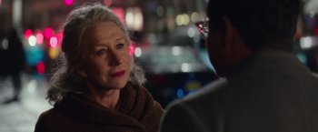 Movie still from “Collateral Beauty” (2016), directed by David Frankel – An older woman sitting in front of a man; Close Up shot, Over the shoulder angle