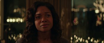 Movie still from “Collateral Beauty” (2016), directed by David Frankel – A person looking at the camera; Close Up shot, Over the shoulder angle