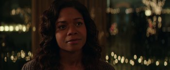 Movie still from “Collateral Beauty” (2016), directed by David Frankel – A person with long hair; Close Up shot, Over the shoulder angle