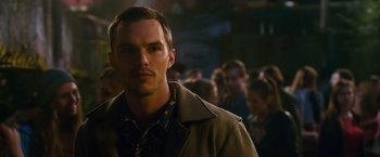 Movie still from “Collide” (2016), directed by Eran Creevy – A person wearing a jacket; Close Up shot, Over the shoulder angle