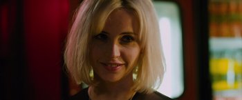 Movie still from “Collide” (2016), directed by Eran Creevy – A person with blonde hair; Close Up shot, Over the shoulder angle