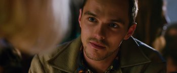 Movie still from “Collide” (2016), directed by Eran Creevy – A man's face in a green jacket; Close Up shot, Over the shoulder angle