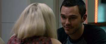 Movie still from “Collide” (2016), directed by Eran Creevy – A man and a woman are looking at each other in the mirror; Close Up shot, Over the shoulder angle