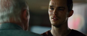 Movie still from “Collide” (2016), directed by Eran Creevy – A person talking to another person; Close Up shot, Over the shoulder angle