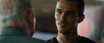 Movie still from “Collide” (2016), directed by Eran Creevy – A person talking to another person; Close Up shot, Over the shoulder angle