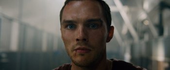 Movie still from “Collide” (2016), directed by Eran Creevy – A person with blue eyes; Close Up shot, Low angle