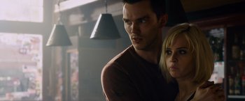 Movie still from “Collide” (2016), directed by Eran Creevy – A man and a woman standing next to each other in a room; Close Up shot, Low angle